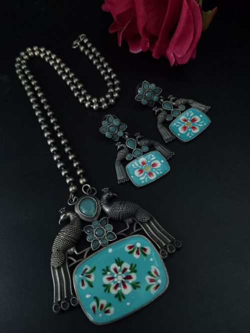 Hand-painted peacock necklace set with silver plating and stones