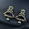 German silver peacock stud earrings with pearl and stone detailing