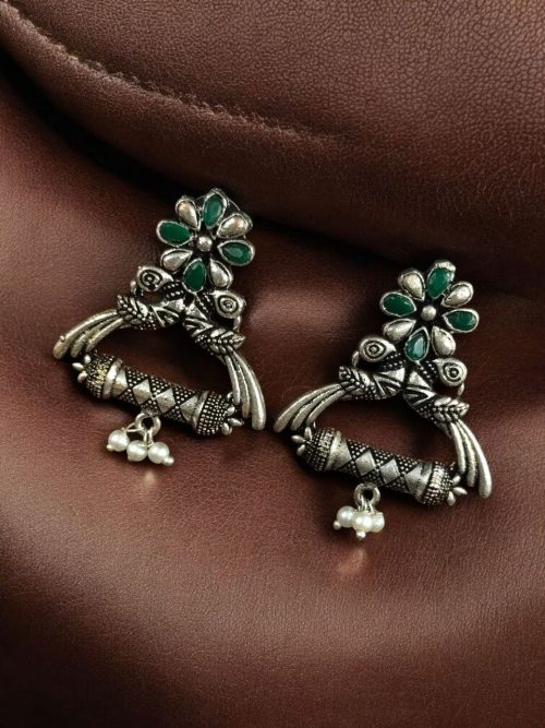 German silver peacock stud earrings with pearl and stone detailing