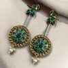 Two-tone traditional bird design dangler earrings with pearl and stone work