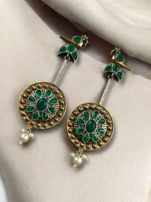 Two-tone traditional bird design dangler earrings with pearl and stone work