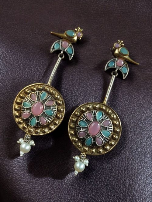 Two-tone traditional bird design dangler earrings with pearl and stone work