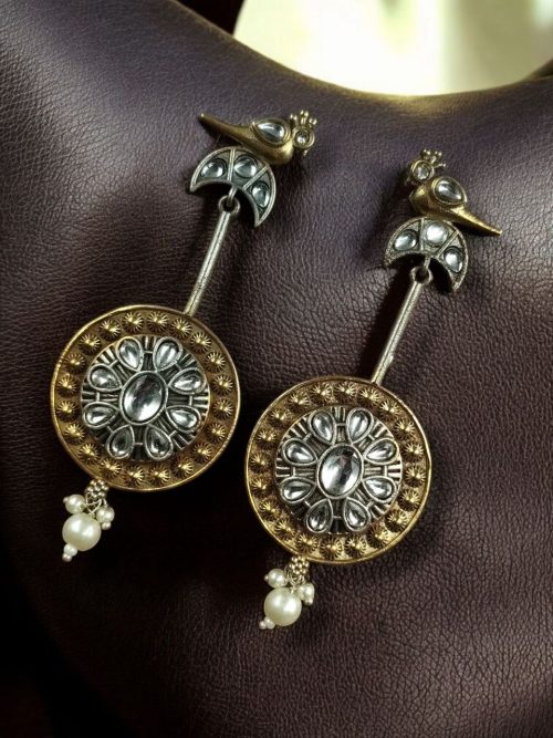 Two-tone traditional bird design dangler earrings with pearl and stone work