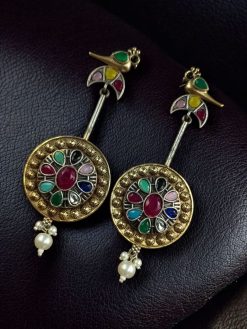 Two-tone traditional bird design dangler earrings with pearl and stone work
