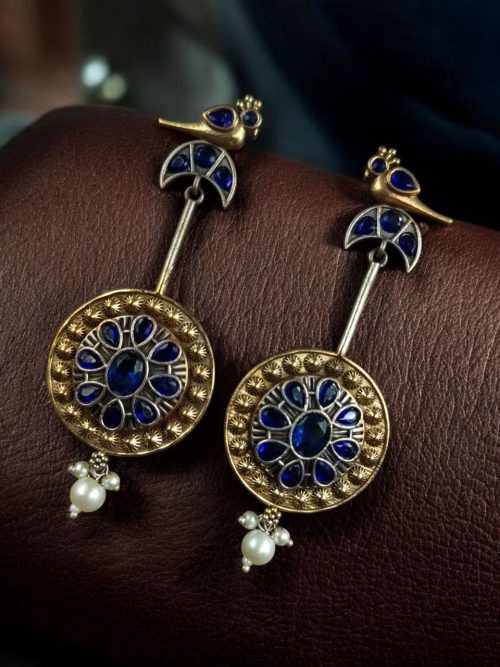 Two-tone traditional bird design dangler earrings with pearl and stone work