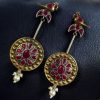 Two-tone traditional bird design dangler earrings with pearl and stone work