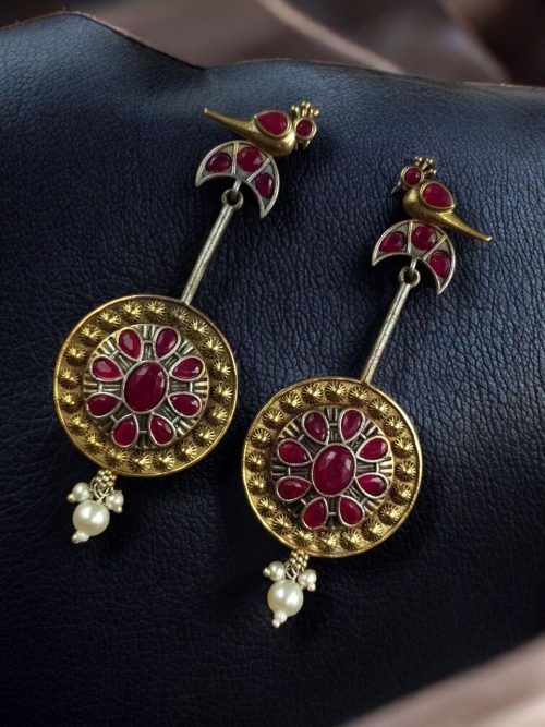 Two-tone traditional bird design dangler earrings with pearl and stone work