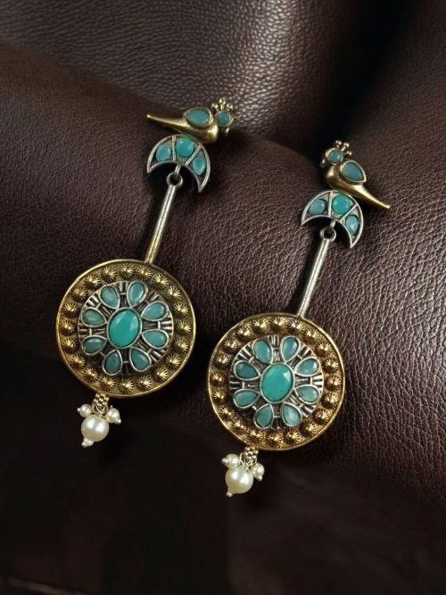 Two-tone traditional bird design dangler earrings with pearl and stone work