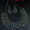 Silver plated leaf design necklace set with stone and pearl work.