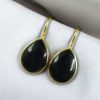 Gold-plated ethnic drop shape dangler earrings with hook style