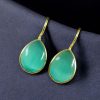 Gold-plated ethnic drop shape dangler earrings with hook style