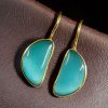 Gold plated half circle earrings with Monalisa stone and hook design