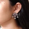 Ethnic silver plated pearl stud earrings with stone work