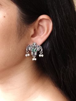 Ethnic silver plated pearl stud earrings with stone work