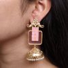 Gold plated floral art jhumka earrings with Monalisa stone and pearl work