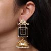 Gold plated floral art jhumka earrings with Monalisa stone and pearl work