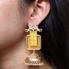 Gold plated floral art jhumka earrings with Monalisa stone and pearl work