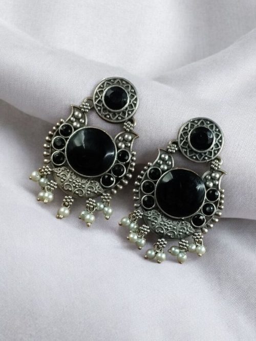 Oxidized silver plated floral earrings with pearl work and Monalisa stone.