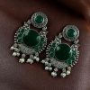 Oxidized silver plated floral earrings with pearl work and Monalisa stone.