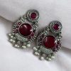 Oxidized silver plated floral earrings with pearl work and Monalisa stone.