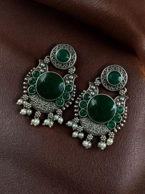 Oxidized silver plated floral earrings with pearl work and Monalisa stone.