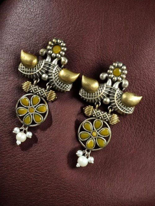 Two-tone bird earrings with pearl and stone work, lightweight ethnic dangler.