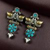 Two-tone bird earrings with pearl and stone work, lightweight ethnic dangler.
