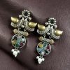 Two-tone bird earrings with pearl and stone work, lightweight ethnic dangler.