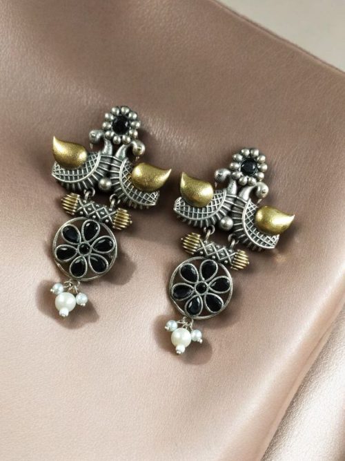 Two-tone bird earrings with pearl and stone work, lightweight ethnic dangler.