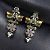 Two-tone bird earrings with pearl and stone work, lightweight ethnic dangler.