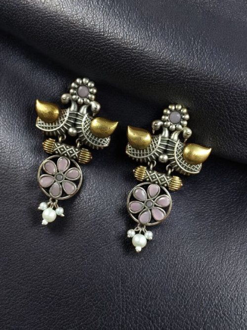 Two-tone bird earrings with pearl and stone work, lightweight ethnic dangler.
