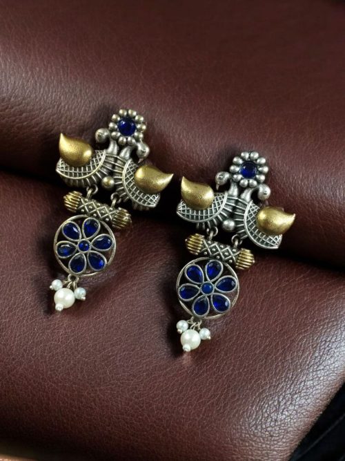 Two-tone bird earrings with pearl and stone work, lightweight ethnic dangler.
