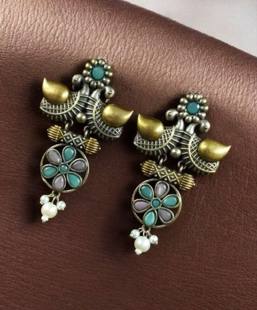 Two-tone bird earrings with pearl and stone work, lightweight ethnic dangler.