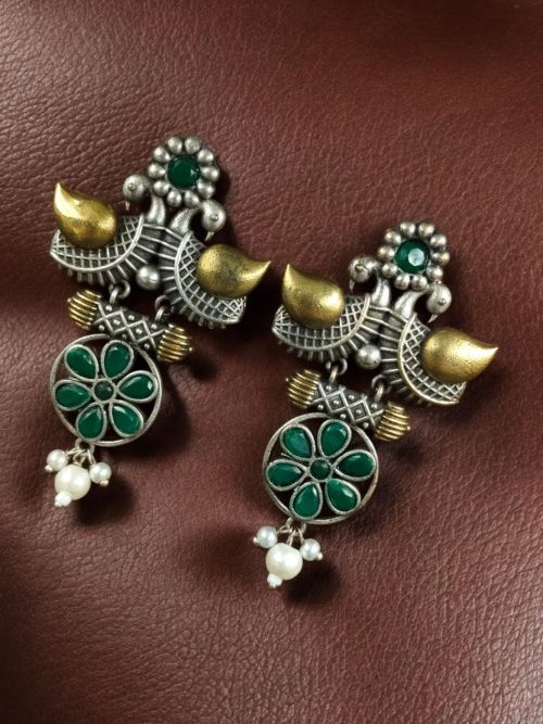 Two-tone bird earrings with pearl and stone work, lightweight ethnic dangler.
