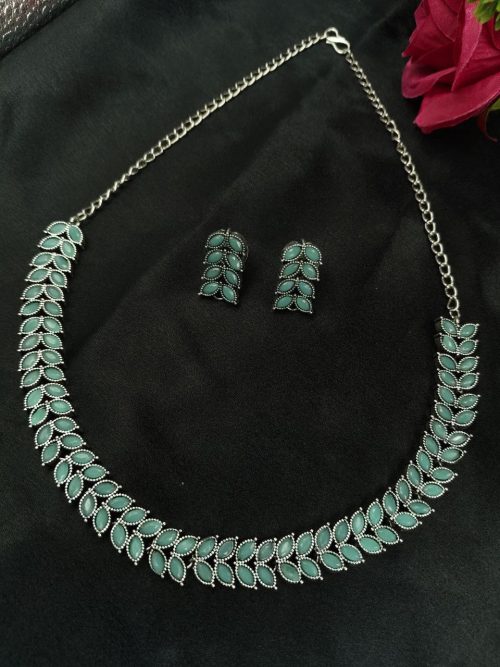 Oxidized silver plated leaf necklace set with stone work