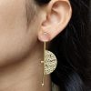 Gold plated half circle earrings with floral art and stone work