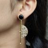 Gold plated half circle earrings with floral art and stone work