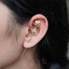 Gold plated flower earcuff for daily wear jewelry.