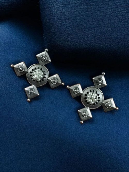 Boho inspired silver plated pearl work ethnic earrings for women.