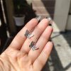 German silver butterfly dangler hook earrings for daily wear and casual outfits.
