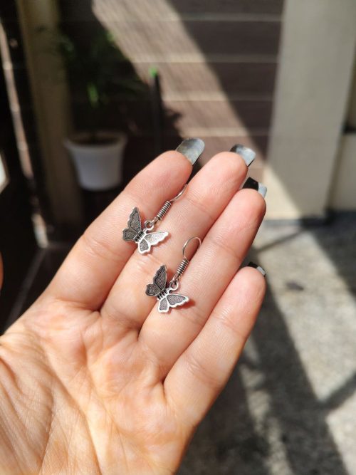 German silver butterfly dangler hook earrings for daily wear and casual outfits.