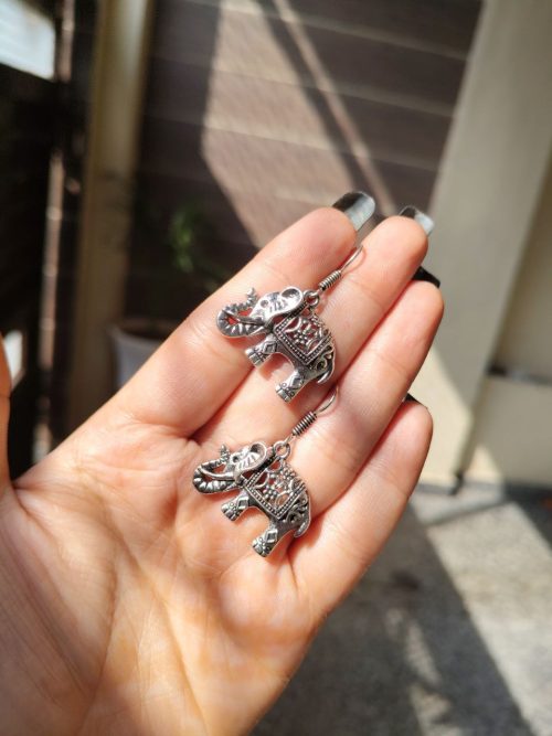 Lightweight German silver elephant dangler hook earrings for everyday and casual wear.