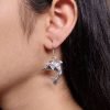 German silver dolphin dangler earrings for daily wear and casual outfits.