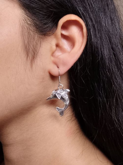 German silver dolphin dangler earrings for daily wear and casual outfits.
