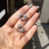 Handcrafted German silver fish hook dangler earrings for everyday wear.