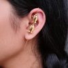Gold-plated fish earcuff for ethnic and western daily wear.