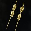 Gold-plated fish earcuff for ethnic and western daily wear.