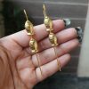 Gold-plated fish earcuff for ethnic and western daily wear.
