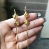 Gold plated flower earcuff for daily wear jewelry.