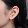 Gold plated floral art earcuff for women